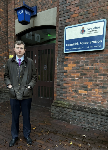 Mike Prendergast outside police station. 